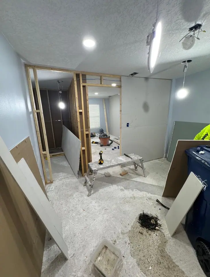 Interior remodel with new wood framing and drywall sheets hung