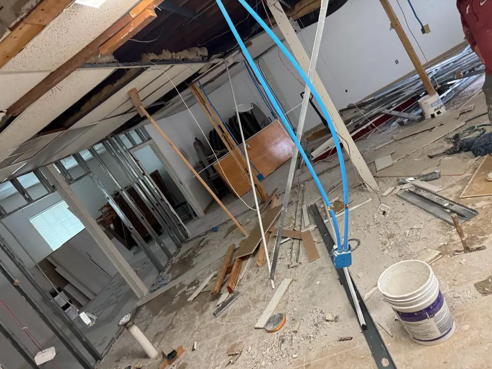 Commercial interior with large-format tile and a decorative floor inlay