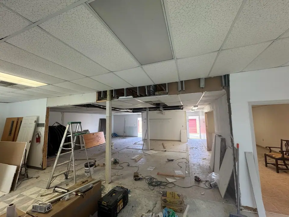 Commercial interior with large-format tile and a decorative floor inlay