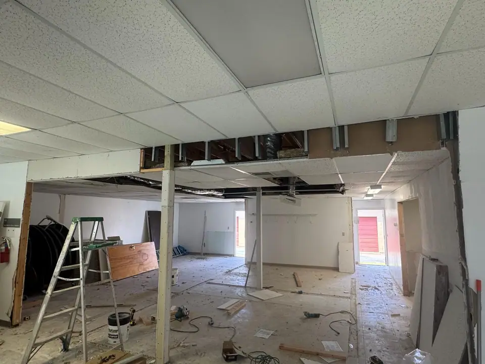 Commercial interior with large-format tile and a decorative floor inlay